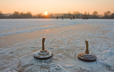 Winter sports - curling on a frozen lake