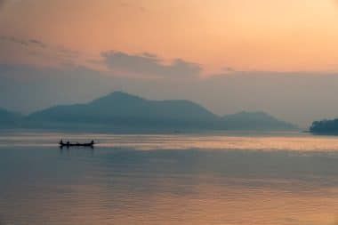 Sunset view with boats on the Brahmaputra River in Guwahati
